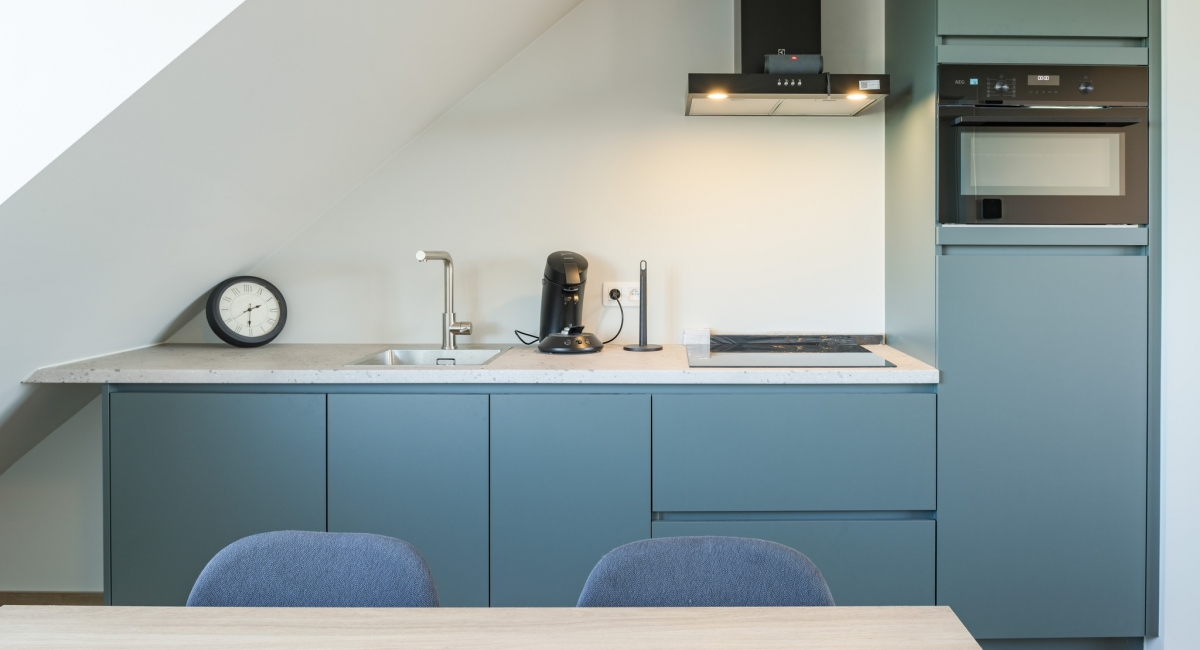 Verbouwing van handelsruimte met appartement